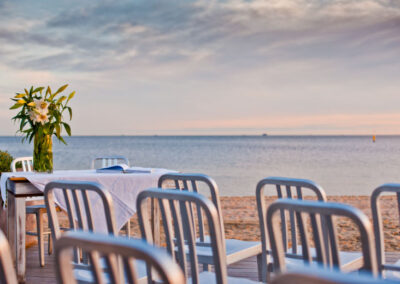 Chairs set up The Sandbar Beach Cafe